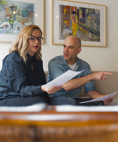 middle aged couple meeting with notary